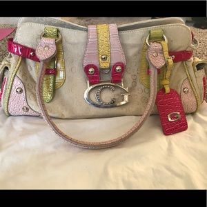 Guess shoulder bag, pink, green, and tan